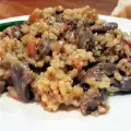 Куриные сердечки с рисом на плите