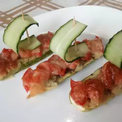 Кабачки в духовке с сосисками и помидорами