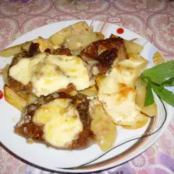 Отбивные в духовке с картошкой и плавленым сыром