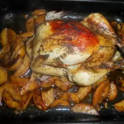 Запеченная фаршированная курица с картофелем