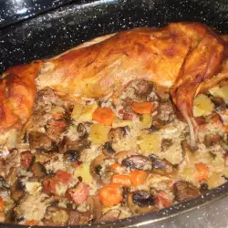 Фаршированный маринованный кролик с рисом и овощами