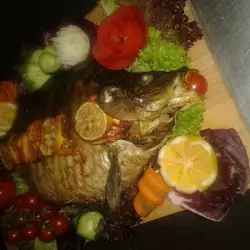 Рыба в духовке с чесноком