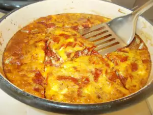 Перцы с брынзой и яйцами в духовке