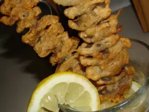 Улитки в панировке на шампурах