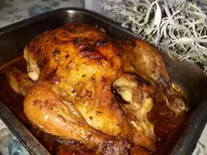 Целый печеный цыпленок с розмарином и сливочным маслом