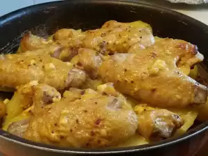 Куриные крылышки на картофельной подушке