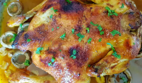 Медленно запеченная курица с грибами и маслом