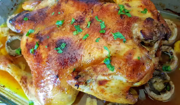 Медленно запеченная курица с грибами и маслом