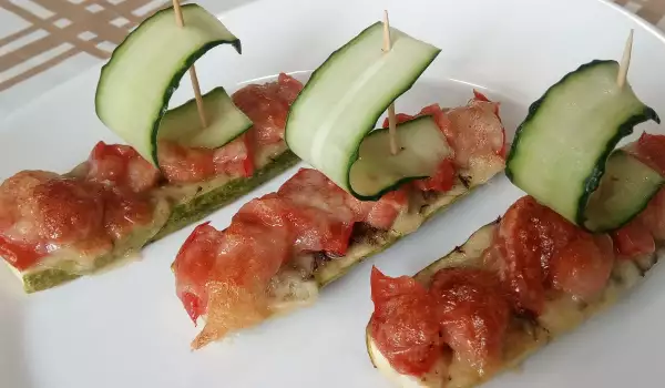 Кабачки в духовке с сосисками и помидорами