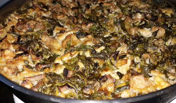Потроха ягненка с грибами, рисом и зеленью