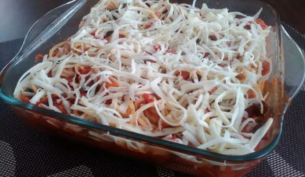 Спагети в духовке с приправами и сыром