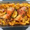 Куриные ножки с картофелем, луком и белым вином
