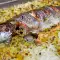 Радужная форель с рисом и луком-пореем в духовке
