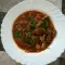 Куриная печень и сердечки с грибами и луком