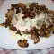 Язык с соусом и грибами