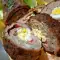 Мясной рулет, запеченный с яйцами, плавленым сыром и сладким перцем
