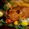 Запеченный поросенок, фаршированный ветчиной и грибами