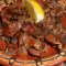 Острые куриные желудочки в сливочном масле