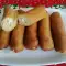 Длинные жареные пирожки с брынзой