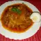 Свежая капуста с морковью и помидорами в духовке