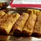 Рулетики из жареных ломтиков хлеба с сыром и ветчиной