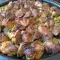 Садж из свинины с зеленым луком и чесноком
