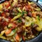 Садж с маринованной свининой и овощами