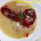 Перец фаршированный мясом и рисом под белым соусом