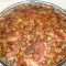 Свиные отбивные с грибами и кислыми огурчиками в духовке