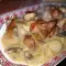 Свинина с репчатым луком и грибами в сметанном соусе