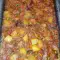 Свинина, запеченная с картофелем, помидорами и горошком
