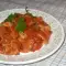 Свинина, тушеная с помидорами