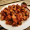 Кусочки свинины с луком и красным вином