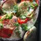 Запеченный толстолобик с помидорами и луком