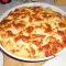 Запеканка с картошкой, ветчиной и кислыми огурчиками