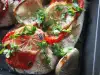 Запеченный толстолобик с помидорами и луком